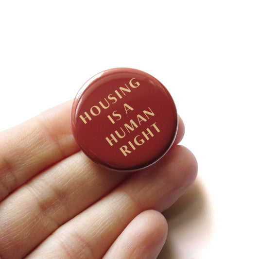 HOUSING IS A HUMAN RIGHT Pinback Button