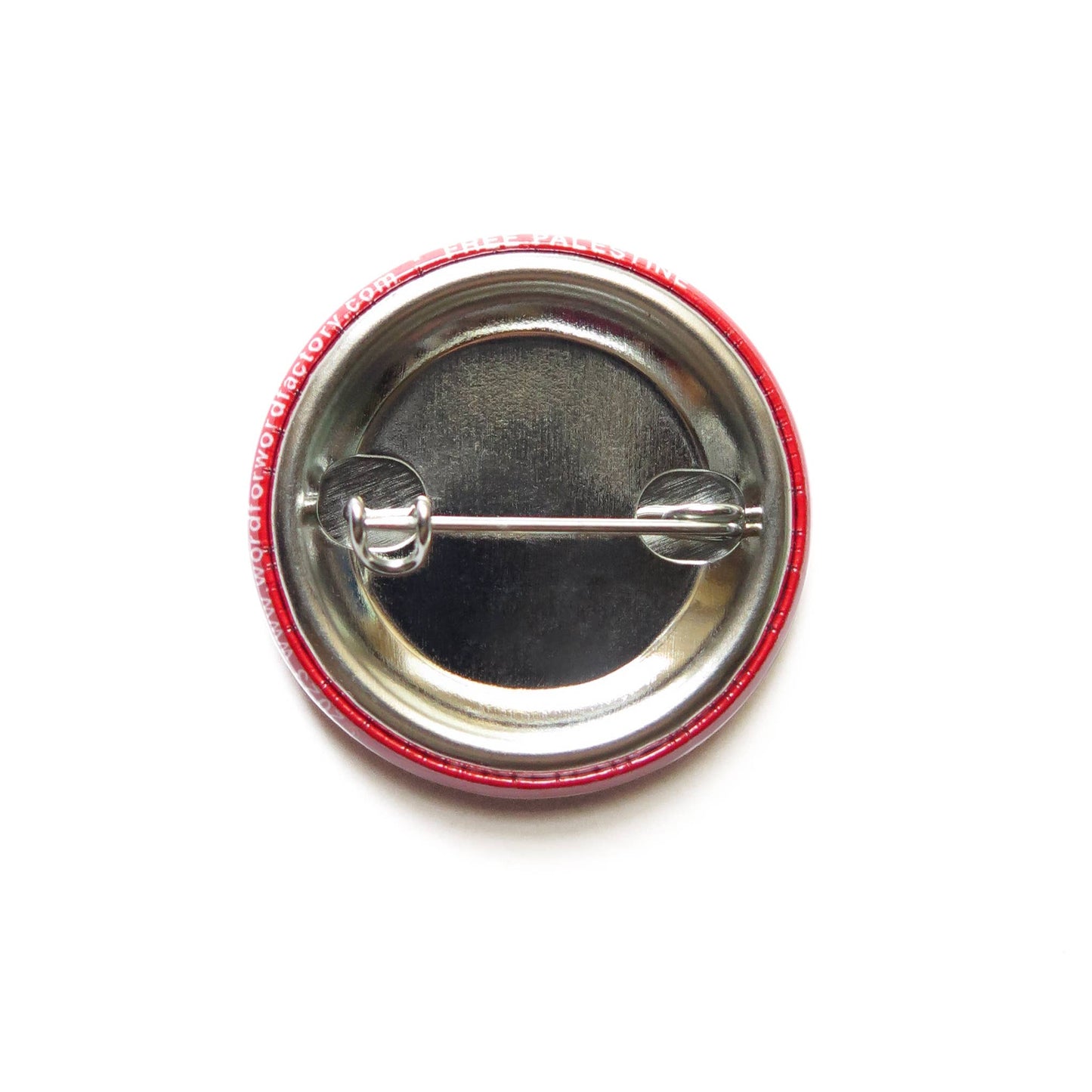 Metal back of the red “resist” button