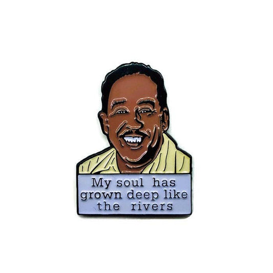 Enamel pin with a portrait of Langston Hughes and the quote 'My soul has grown deep like the rivers' on a white background.
