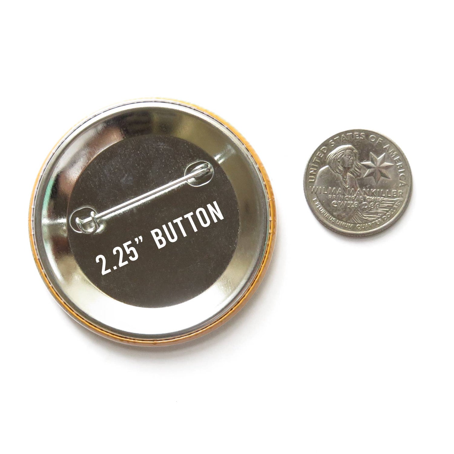 Back of button with '2.25" Button' label edited on top, next to a coin for size comparison on a white background