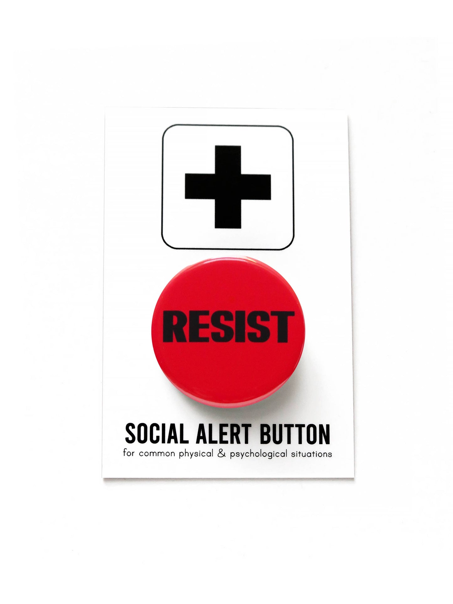 Red “Resist” button on a white and black “Social Alert Button for common physical & psychological situations” card