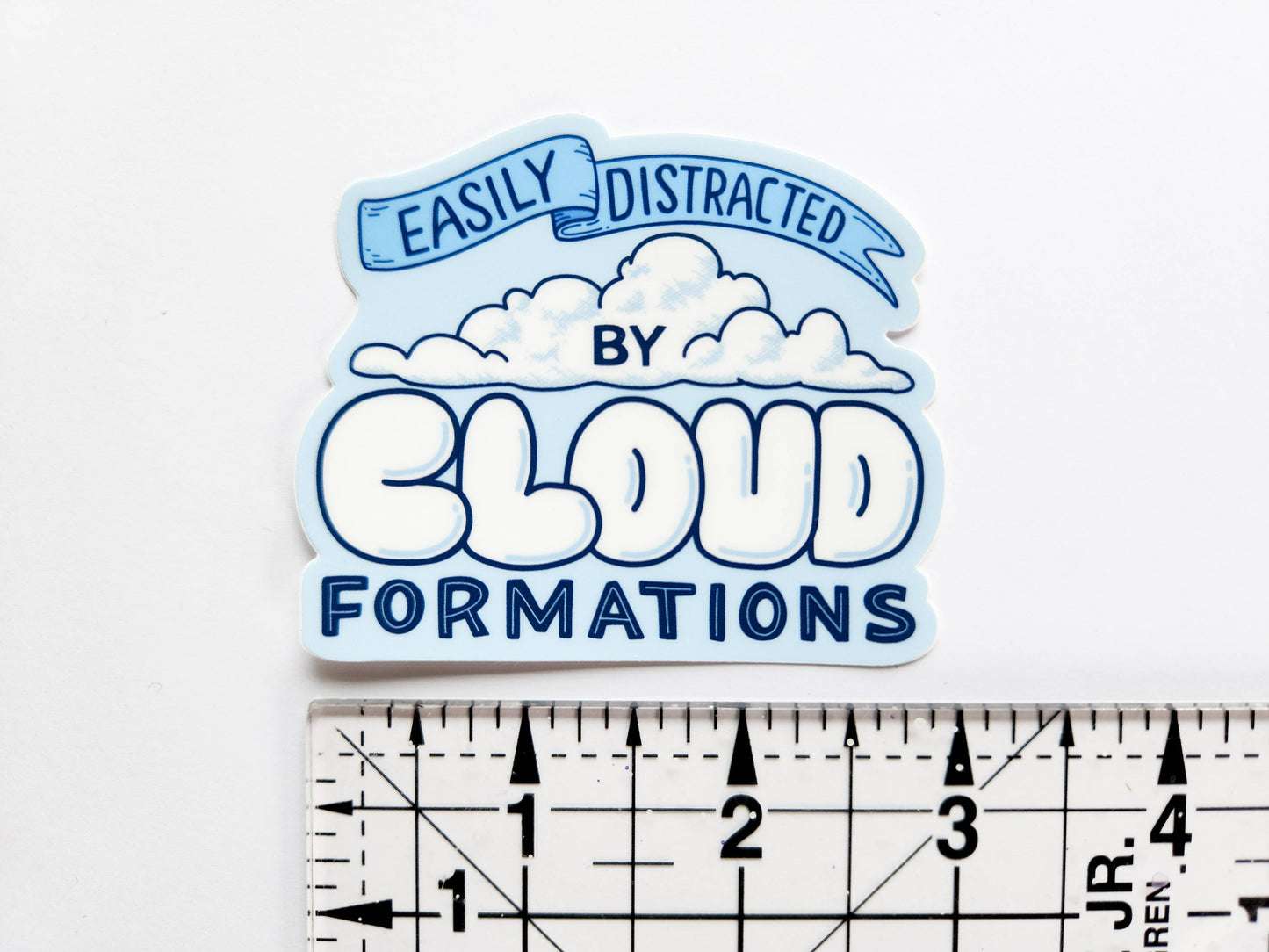 "Easily Distracted By Cloud Formations" Sticker