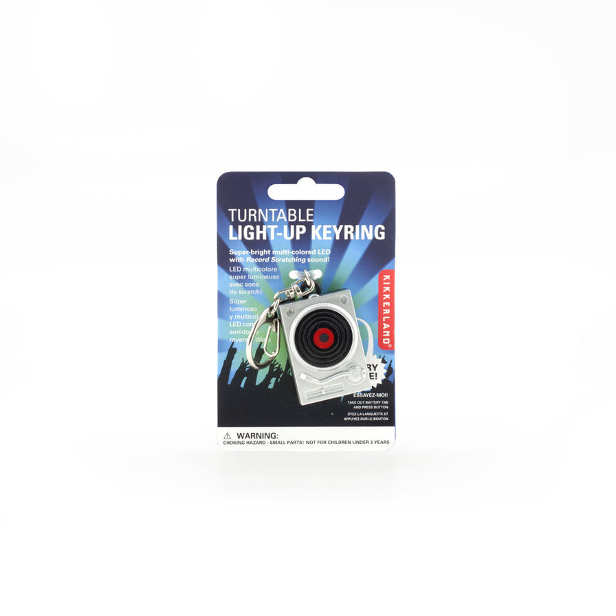 Image of the Turntable LED Keychain, in its packaging, on a white background.
