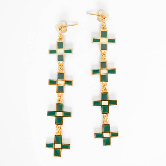 A pair of gold-plated stainless steel earrings with a geometric pattern in green and gold colors, designed by Bethany Yellowtail.