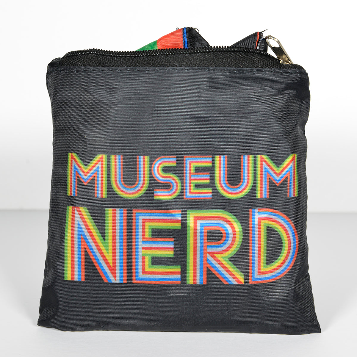 Museum Nerd tote folded and in small container bag.