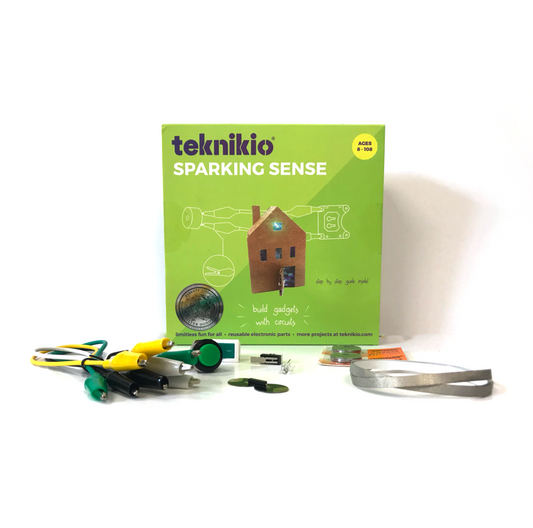 Product photo for the Teknikio Sparking Science Kit, showing materials included.