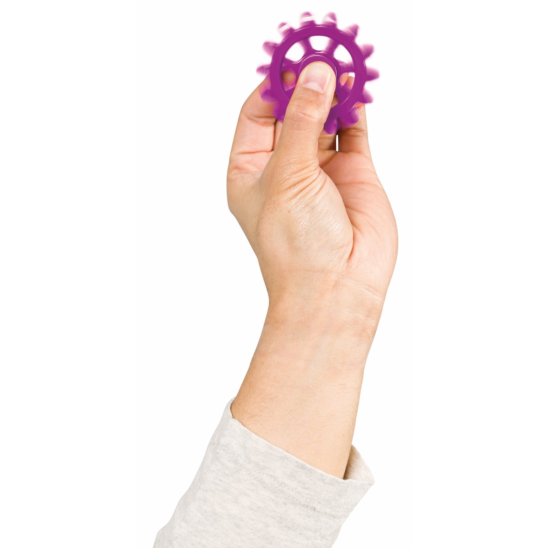 Photo of hand model, using the “Cog-Nitive” Fidget Toy.