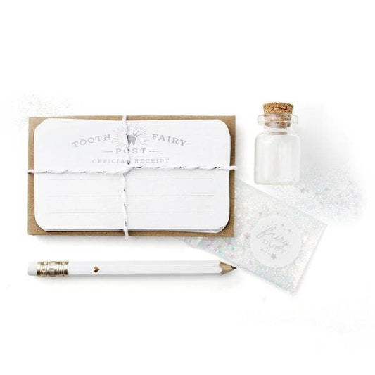 Photo of what is included in, and the retail packaging for, the Tooth Fairy Kit.