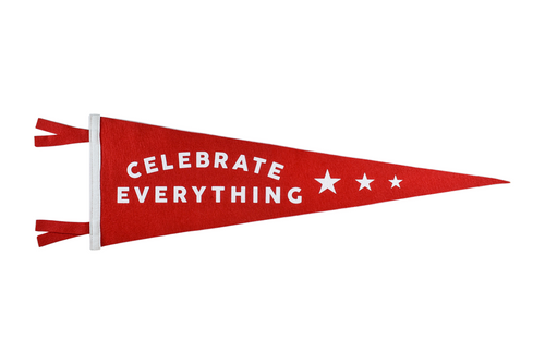 Image of the red “Celebrate Everything” Pennant, on a white background.