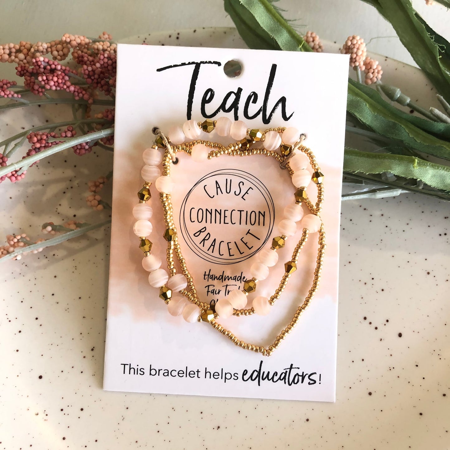 Image of the Cause Connection Bracelet, in the Teach theme.