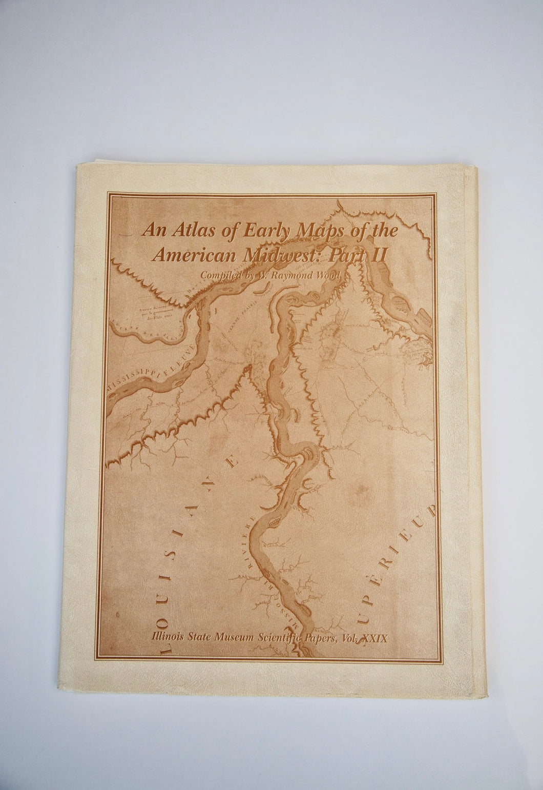 Photo of the front cover of “An Atlas of Early Maps of the American Midwest: Part II”