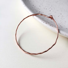 Load image into Gallery viewer, Photo of the copper “Interlocking Ripple” Bracelet.
