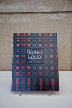 Load image into Gallery viewer, “Weavers Choice: Patterns in American Coverlets” book on a book stand.

