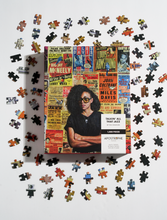 Load image into Gallery viewer, Photo of the “Talkin’ All That Jazz” puzzle, in its box, next to sample pieces.
