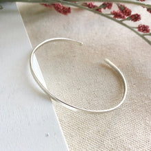 Load image into Gallery viewer, Image of the silver “Simple Band” Cuff.
