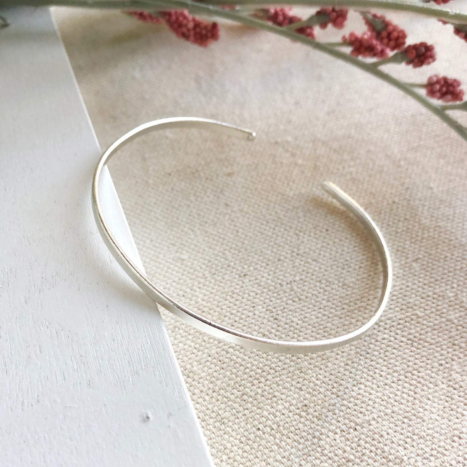 Image of the silver “Simple Band” Cuff.