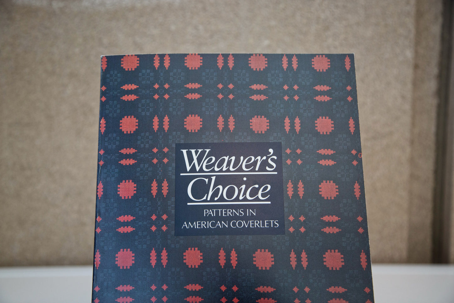 Closer image of cover of “Weaver’s Choice: Patterns in American Coverlets”.