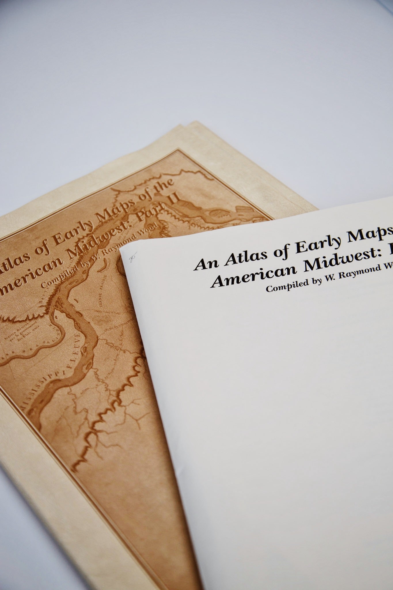 The front cover and inside map cover of “An Atlas of Early Maps of the American Midwest: Part II”
