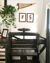 Load image into Gallery viewer, Photo of the Midwest Pennant, styled on a wall in a home.

